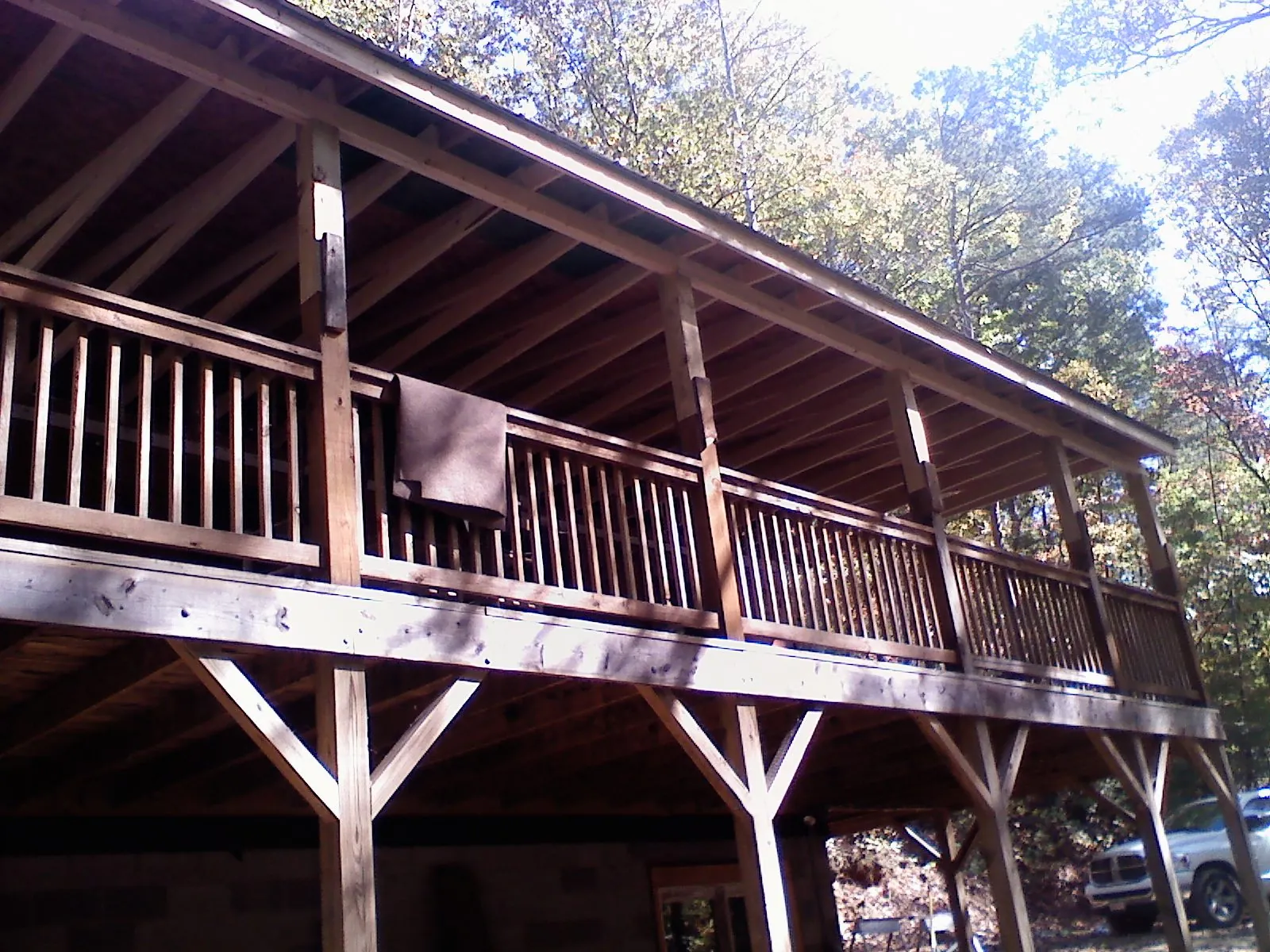 Timber framing under a new elevated porch and deck — Roof Leak Repair in La Porte by Roofing Brothers